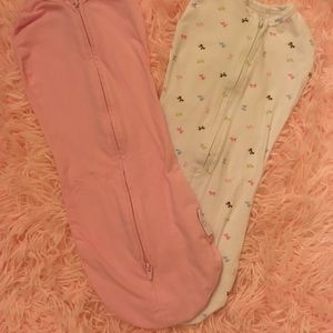 Never used zip up swaddles new born